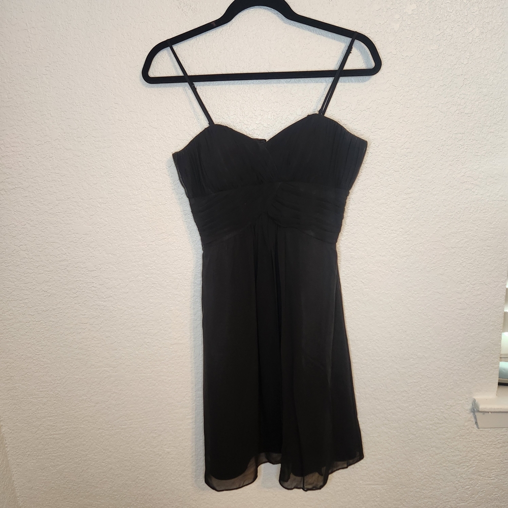 White House Black Market A-line dress with a ruched bodice and chiffon size 6